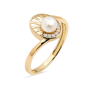 The 14K Solid Gold Natural Pearl Ring from the Elegance Collection features an artistic swirl design, highlighting a natural pearl and adorned with sparkling diamonds. Crafted in 14K solid gold, this ring exemplifies elegance through sustainable methods.