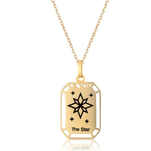 Discover "The Star" from our Tarot Collection, a 14K solid yellow gold necklace featuring a delicately crafted rectangular tarot pendant with a central star design surrounded by smaller stars. This hypoallergenic piece is elegantly engraved with "The Star" at the bottom and comes with a simple, delicate chain.