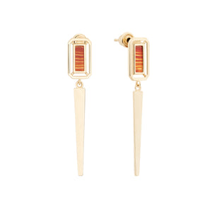 Introducing the Achates Collection: 14K Solid Gold Natural Agate/Carnelian Earrings. These exquisite gold drop earrings feature a geometric design with elongated rectangular gems adorned with striking orange stripes. Each piece boasts a long, pointed gold drop extending gracefully downward, ideal for those who admire distinctive gemstone earrings.