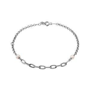 Presenting our 14K Solid Gold Natural Pearl Bracelet from the Elegance Collection, this exquisite piece showcases a blend of round and elongated links in stunning solid gold, decorated with two natural white pearls. Hypoallergenic and crafted with a secure clasp closure, it offers everyday elegance effortlessly.