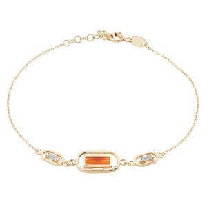 Introducing the 14K Solid Gold Natural Carnelian / Agate Gemstone Chain Bracelet from the Achates Collection. This exquisite piece features a central rectangular carnelian stone flanked by two smaller rectangular clear agate stones. Its simple chain design is complemented with an adjustable clasp for a perfect fit.