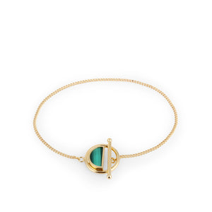 Introducing the 14K Solid Gold Unique Toggle Lock Malachite Bracelet from the Endless Collection, this piece showcases a delicate chain and features a circular green malachite gemstone inlay, offering both elegance and hypoallergenic comfort.