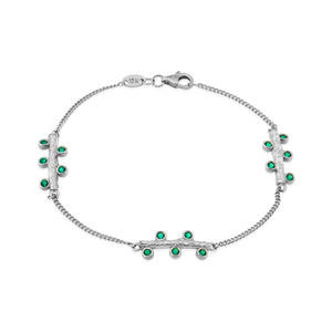 Experience the exquisite beauty of the 14K Solid Gold Blossom Bracelet from the Into the Woods Collection by Erdem Akan. This elegant piece features a delicate chain adorned with green gemstones and three horizontal bars, each embellished with vibrant stones. The fine gold chain includes a secure clasp and is hypoallergenic, available in yellow, white, or rose gold options.