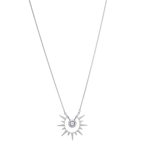 The 14K Solid Gold Sunburst Necklace from the Helios Collection features a sunburst pendant with a central cubic zirconia gemstone, surrounded by elegantly extending spiked rays. It hangs gracefully on a delicate, hypoallergenic chain.