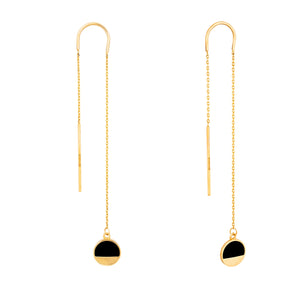 Experience the elegance of the 14K Solid Gold The First Quarter Moon Thread Chain Drop Earrings from the Moonlight Collection. These modern, minimalist earrings boast a sleek hypoallergenic design, featuring a delicate chain and slender bar that thread gracefully through the ear, culminating in a circular black enamel charm. Handcrafted jewelry at its finest.