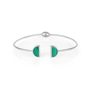 Introducing the 14K Solid Gold Malachite Gemstone Open Cuff Bangle Bracelet from the Endless Collection. This slim accessory showcases a circular design, featuring two semi-circle inlays of natural green malachite at the opening. Hypoallergenic and ideal for sensitive skin, it offers a modern and elegant touch to any outfit.