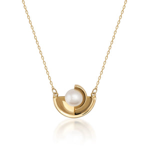 Introducing the Elegance Collection's 14K Solid Gold Natural Pearl Necklace, featuring a circular pendant showcasing a natural pearl at its center. The design includes two gold crescent shapes gently cradling the pearl, all beautifully crafted in 14K real solid yellow gold and suspended on a delicate hypoallergenic gold chain.