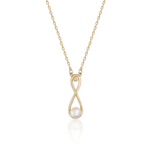 The 14K Solid Gold Natural Pearl Necklace from the Elegance Collection features an infinity-shaped pendant crafted from real solid yellow gold. The pendant beautifully displays a natural pearl at the bottom intersection and a small diamond at the top loop, all suspended on a simple, hypoallergenic chain.