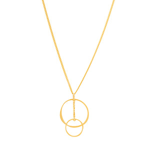 This necklace from the Harmony Collection is designed with sustainable methods and features a delicate chain adorned with two interlocking circles. Crafted from 14K real solid yellow gold, the larger circle gracefully joins a smaller one, creating a simple and elegant design against a plain white background.