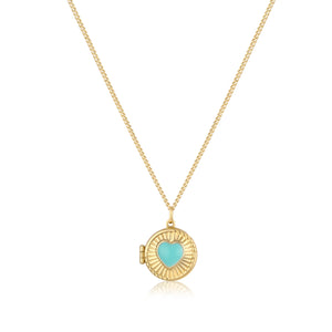 This exquisite necklace from the Timeless Collection, named the "14K Solid Gold Heart & Shell Enamel Custom Photo Locket Medallion Necklace," features a circular pendant with a red heart center and ribbed design. Crafted from hypoallergenic 14K real solid yellow gold, it elegantly hangs from a fine chain, offering multiple chain size options for the perfect fit.