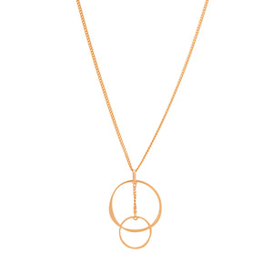 This necklace from the Harmony Collection is designed with sustainable methods and features a delicate chain adorned with two interlocking circles. Crafted from 14K real solid yellow gold, the larger circle gracefully joins a smaller one, creating a simple and elegant design against a plain white background.