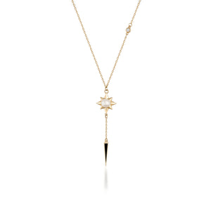 The 14K Solid Gold Natural Pearl Necklace from the Elegance Collection showcases a star-shaped pendant with a natural pearl at its center. It is attached to a long chain that ends in a black pointed charm, accented by a small crystal above the star, all set against a plain white background.