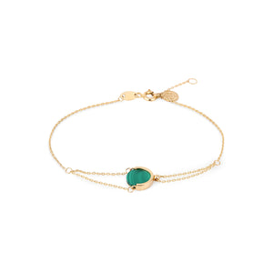 The 14K Solid Gold Unique Statement Malachite Gemstone Chain Bracelet from the Endless Collection features a round Malachite gemstone centerpiece on a delicate chain. Its adjustable clasp and small gold links enhance its elegant and minimalist appeal.