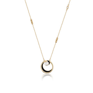 The necklace from the Elegance Collection is made of 14K solid yellow gold and features a circular pendant with a black accent and a natural pearl at its center. The hypoallergenic chain is delicate and enhances the elegant design of the pendant.