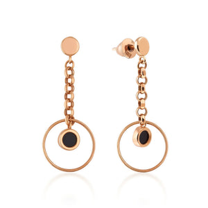 Introducing the Moonlight Collection's 14K Solid Gold Black Enamel Chain Drop Earrings. These elegant earrings feature a chain design with small black enamel circular pendants set in genuine 14K solid gold, each artfully suspended within a larger gold ring. Designed for comfort and security, they are hypoallergenic and come with a post and butterfly clutch back.