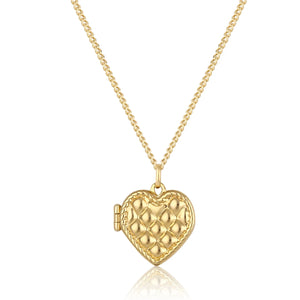 The 14K Solid Gold Heart Shaped Custom Photo Locket Medallion Necklace from the Timeless Collection is crafted from genuine solid yellow gold and features a quilted texture with a delicate rope border. This hypoallergenic piece hangs elegantly from a sleek chain and is beautifully displayed against a plain white background.