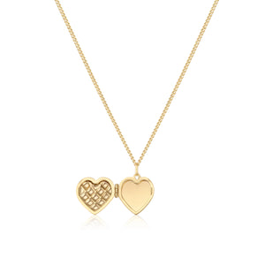 The 14K Solid Gold Heart Shaped Custom Photo Locket Medallion Necklace from the Timeless Collection is crafted from genuine solid yellow gold and features a quilted texture with a delicate rope border. This hypoallergenic piece hangs elegantly from a sleek chain and is beautifully displayed against a plain white background.