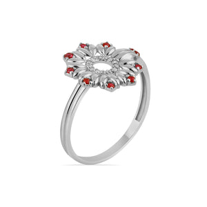 Presenting the 14K Solid Gold The Flower Cycle Lab-Grown Diamond & Ruby Ring from the Chloris Collection. This exquisite ring showcases a floral design in solid gold, adorned with lab-grown rubies on the petals and additional sparkling gems at its center. It features a thin, smooth band, set against a white background.