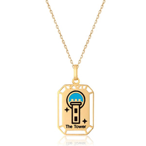 Presenting "The Tower" from our Tarot Collection, this 14K solid yellow gold necklace features a tarot pendant beautifully illustrating a stylized tower and the words "The Tower." The design is enhanced with a black depiction and topped with a blue semicircle. This hypoallergenic piece is elegantly finished with a geometric border featuring small cutouts.