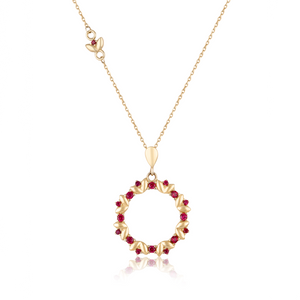 The Flower Ledder Ruby Pendant Necklace from the Chloris Collection showcases a circular pendant embellished with small lab-grown ruby accents and a delicate bow, intricately crafted from hypoallergenic 14K solid gold.