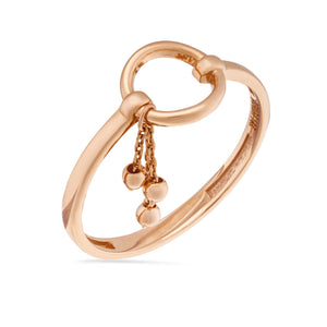 This exquisite piece from the Harmony Collection, named the 14K Solid Gold Unique Chain Drop Ring, showcases an artfully crafted circular design with two interconnected loops. Hanging from one of the loops are two delicate gold chains, each highlighted by a round bead, elegantly captured against a plain white background.