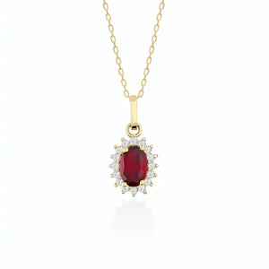 The 14K Gold Ruby Necklace showcases an exquisite oval-shaped red ruby encircled by a halo of sparkling diamonds. Its delicate chain enhances the pendant's refined elegance, while its hypoallergenic quality guarantees comfortable wear. The necklace is set against a plain, light background for added elegance.