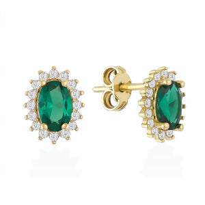 Introducing the 14K Gold Oval Shaped Stud Emerald Earrings, adorned with vintage oval-cut green gemstones and bordered by delicate round white diamonds. These earrings boast a polished finish and are secured with a post and butterfly back fastening.