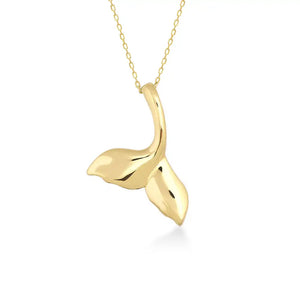 The 14K Gold Whale Mermaid Dolphin Tail Necklace features a pendant shaped like a sleek whale's tail with a polished finish, elegantly suspended from a delicate chain against a white background.