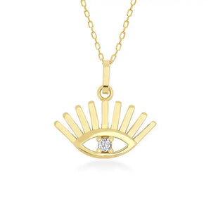 The 14K Solid Gold Evil Eye Necklace showcases a pendant in the shape of an eye, accented with sunburst rays extending above and below. At the center of this elegant design is a small round diamond, all suspended from a delicate gold chain. This piece serves as both a beautiful adornment and a symbol of protection.