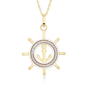 The 14K Gold Ship Wheel and Anchor Necklace is a stunning piece of nautical jewelry, featuring a gold anchor charm at the center of a ship's wheel pendant. The design is elegantly complemented by silver detailing around the anchor, creating a beautiful contrast against the gold finish.