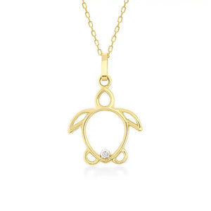 The 14K Gold Sea Turtle / Caretta Caretta Necklace from RundaJewelryUs features a gold turtle pendant with a diamond accent at the bottom center, elegantly hanging from a delicate gold chain against a white background. This exquisite piece of jewelry symbolizes good luck and adds ocean-inspired charm to any ensemble.