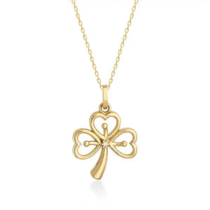 The 14K Gold Clover Pendant Necklace boasts heart-shaped leaves and a central Cubic Zirconia gemstone, with a delicate chain enhancing the gold hue for an exquisite accessory.