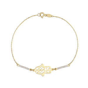 The 14K Gold Hamsa Hand Charm Protection Bracelet is an exquisite piece, featuring a lattice-detailed hamsa hand charm surrounded by small, sparkling gemstones on a delicate chain. This elegant Good Luck Kabbalah Jewelry piece offers both protection and sophistication, secured with a lobster clasp closure.