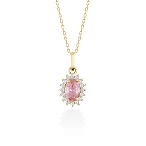 The 14K Gold Rose Quartz Necklace features an oval-shaped pendant with a stunning pink rose quartz gemstone, surrounded by a halo of small white diamonds. Its delicate chain elegantly contrasts with the vibrant stones, symbolizing healing relationships and exuding sophistication.