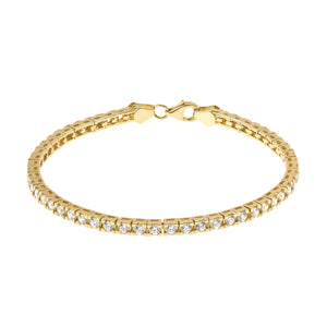 A close-up of the 14K Solid Gold Tennis Chain Bracelet showcases a row of sparkling round cubic zirconia stones, designed in a sleek and elegant style. The bracelet features a secure clasp closure, emphasizing the brilliance of the gems against its smooth gold setting.