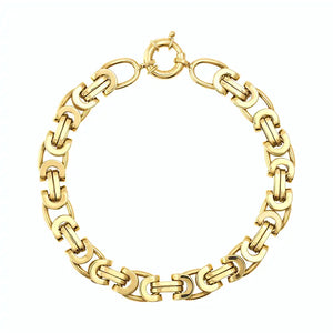 Explore the elegance of the 14K Solid Gold Byzantine Bracelet for Men, featuring a captivating combination of interlocking oval and rectangular links inspired by king chain designs. A circular clasp is elegantly positioned at the top, enhancing its sleek, polished finish against a plain white background.