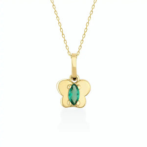 The 14K Gold Emerald Butterfly Necklace features a graceful butterfly-shaped pendant centered with a green marquise-cut gemstone. The delicate chain, crafted from 14K gold, enhances its shiny finish and embodies a minimal positivity charm.