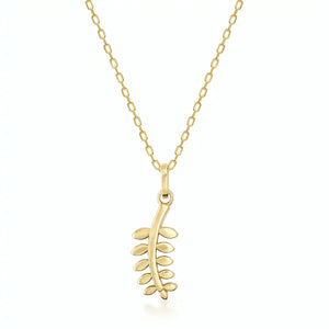 The 14K Solid Gold Dainty Leaf Necklace by RundaJewelryUs features a delicate leafy branch pendant on a fine chain. This handmade jewelry piece highlights small, smooth leaves extending from a central stem, offering an elegant and minimalist design against a plain white background.