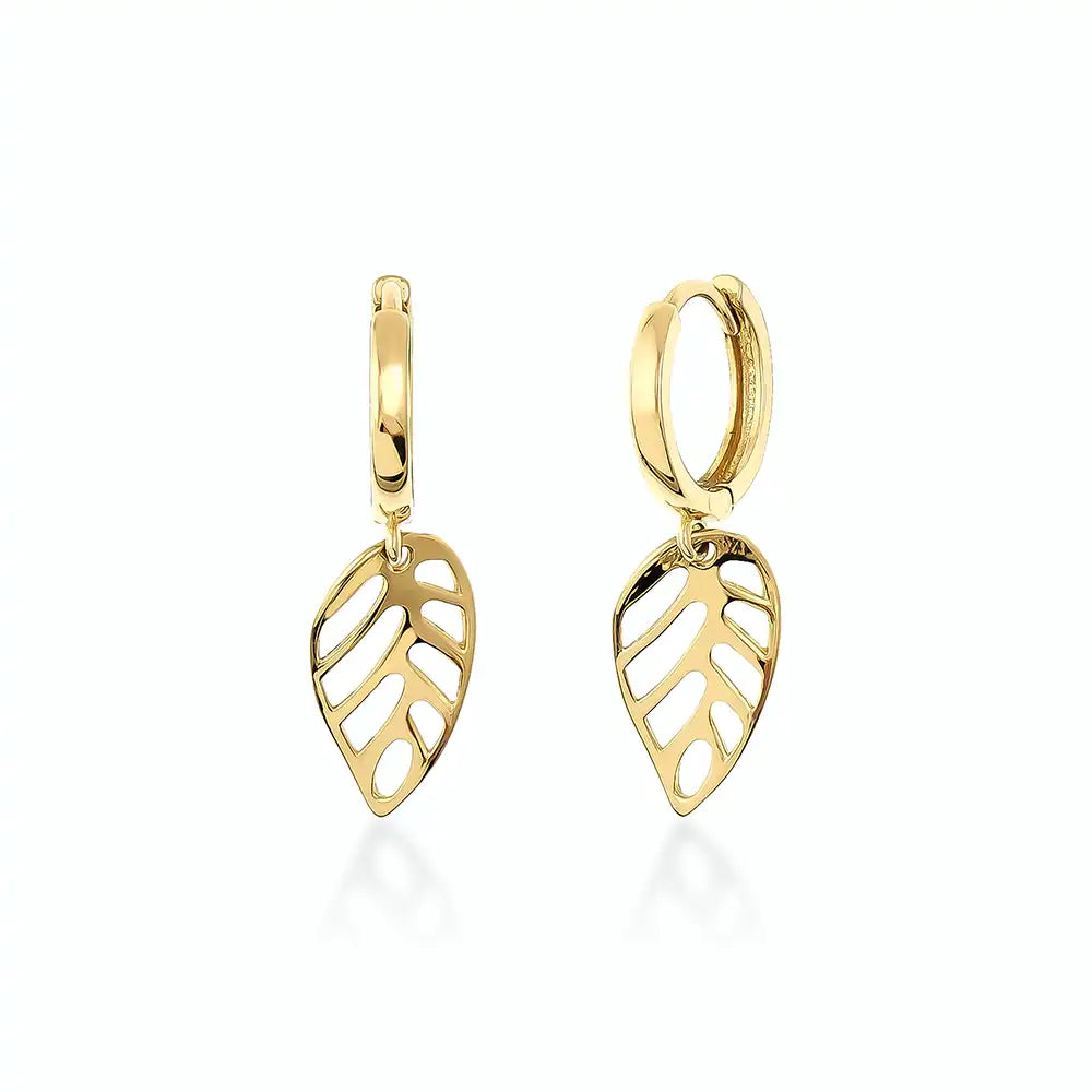 Experience the sophistication of the 14K Gold Leaf Dangle Earrings, featuring elegant leaf-shaped charms and intricate cut-out designs. This exquisite piece is crafted using sustainable methods, adding a unique touch to your handmade gold jewelry collection.