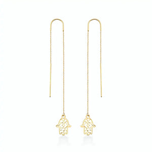 Eco-friendly handcrafted 14K Yellow Gold Long Threader Earrings adorned with delicate Hamsa hand charms are showcased against a plain white background.