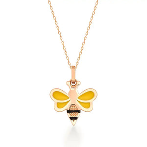 Introducing the Minimal Tiny 14K Real Gold Bee Necklace, featuring a gold chain adorned with a handcrafted bee pendant. Made from 14K solid gold, this exquisite bee design showcases striking black stripes and vibrant yellow wings for an eye-catching look.