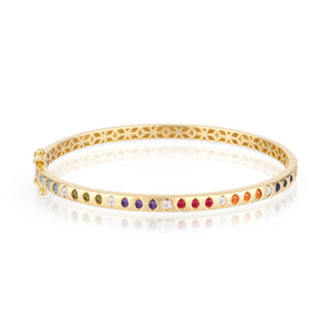 A 14K Solid Gold Diamond Earth Tones Bracelet from the Chloris Collection, featuring a geometric cutout pattern along the sides and adorned with a sequence of colorful lab-grown gemstones set around its outer edge.