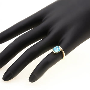 This 14K Solid Gold Aquamarine March Birthstone Solitaire Ring features an exquisite, square-cut aquamarine gemstone set in a prong setting. With its sparkling light blue hue and distinctive asymmetrical band design, this ring offers both elegance and uniqueness.