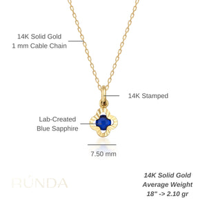 The 14K Solid Gold Clover Sapphire Necklace boasts a refined design with a delicate gold chain and an elegant pendant. The four-leaf clover-shaped pendant is adorned with a striking deep blue sapphire at its center, making it an excellent choice for those born in September.