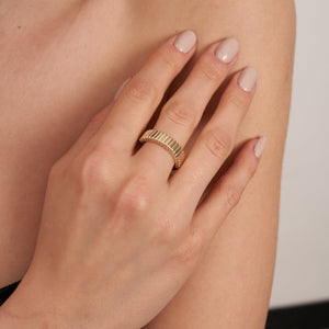 Featuring a bold vintage design, the 14K Solid Gold Dome Ribbed Ring showcases a textured exterior with a ribbed pattern. Part of the Charlotte Line collection, this ring includes a lattice-patterned interior and offers a shiny, polished finish that enhances its elegant and stylish appeal.