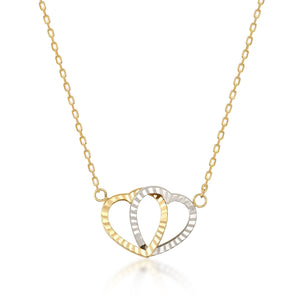 Presenting the exquisite 14K Solid Gold Interlocking Hearts Necklace, featuring two interwoven heart pendants—one crafted in gold and the other in silver—beautifully showcased against a simple white background. This necklace is an ideal couple's gift, representing unity and love.