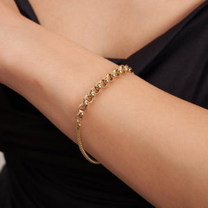 A 14K solid gold bracelet combining thick round box and rolo belcher links, featuring a lobster claw clasp. This stunning piece showcases a sleek, polished appearance, making it a versatile unisex accessory.