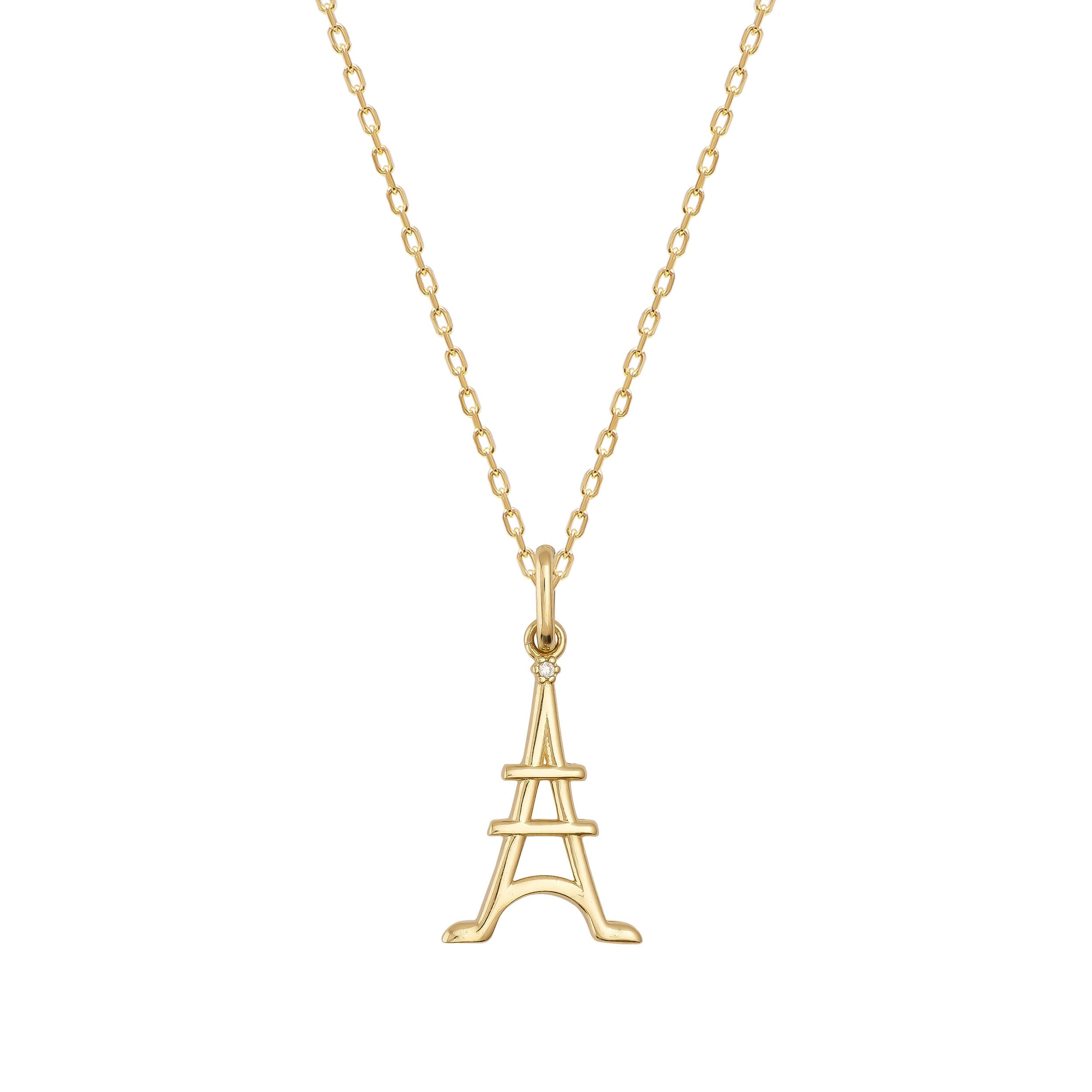 The 14K Solid Gold Minimal Eiffel Tower Pendant Necklace radiates Parisian charm with its elegant design.