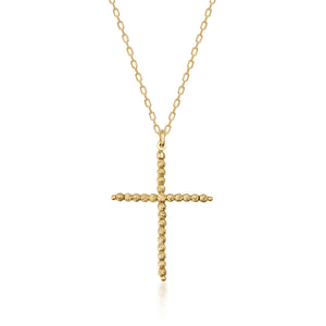 Introducing the 14K Solid Gold Dorika Beaded Cross Pendant Necklace—a masterfully crafted piece that features a religious cross pendant made from twisted gold. This textured design is enhanced with delicate Dorika beads, showcasing its simple yet elegant craftsmanship.