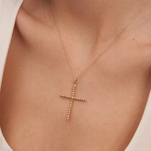 Introducing the 14K Solid Gold Dorika Beaded Cross Pendant Necklace—a masterfully crafted piece that features a religious cross pendant made from twisted gold. This textured design is enhanced with delicate Dorika beads, showcasing its simple yet elegant craftsmanship.